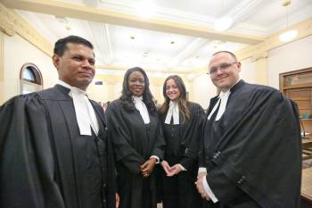 Four new lawyers were called to the bar during a Court of King&rsquo;s Bench ceremony at the Brandon Courthouse on Friday. Satkunan Ruban (from left), Idowu Oluyinka, Lacey Easton and Stewart Lyric took their official oaths to practise law in Manitoba. (Matt Goerzen/The Brandon Sun)