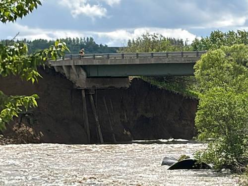 The Highway 83 bridge across the Shell River was closed due 