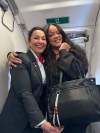 Air Canada flight attendant Lily Kahnerahtiio Dailleboust, left, is pictured with singer Rihanna on a flight on Monday June 1, 2026. THE CANADIAN PRESS/Handout-Lily Kahnerahtiio Dailleboust (Mandatory Credit)