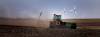 An area farmer seeds his crop on fields between Manitou and St. Leon as windmills from the Manitoba Hydro wind farm rotate in the background. A proposed First Nation wind farm project faces opposition. (Phil Hossack/Winnipeg Free Press files)