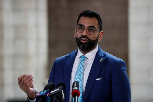 Progressive Conservative Obby Khan, leader of Manitoba&rsquo;s official Opposition, speaks to media outside the legislative chamber. (John Woods/Winnipeg Free Press files)