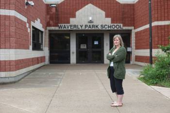 Laura-Lise Yaciuk stands in front of Waverly Park School in Brandon on Tuesday afternoon. She&rsquo;s speaking out after a group of Grade 6 boys forced her 12-year-old son&rsquo;s head into a toilet with feces in it during a school field trip earlier this month. (Tessa Adamski/The Brandon Sun)