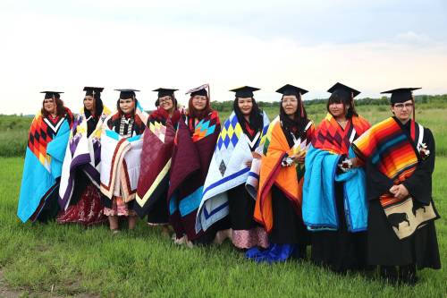 Sioux Valley High School graduates pose for a picture shortly after Monday's ceremony at the Veterans Hall in Sioux Valley Dakota Nation. (Abiola Odutola/The Brandon Sun)