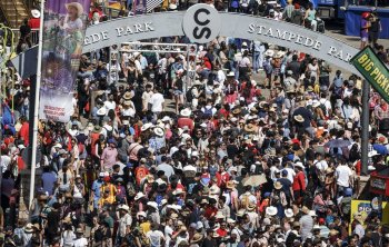 Visitors flock to the Calgary Stampede on Family Day in Calgary, Alta., Sunday, July 7, 2024. THE CANADIAN PRESS/Jeff McIntosh