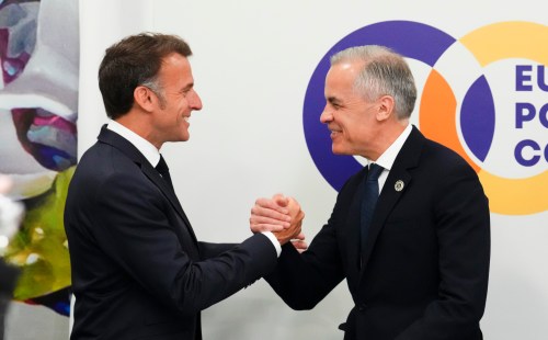 Prime Minister Mark Carney, right, shakes hands with French President Emmanuel Macron as they arrive to take part in a meeting on the situation in Ukraine during the 8th European Political Community Summit in Yerevan, Armenia, on Monday, May 4, 2026. THE CANADIAN PRESS/Sean Kilpatrick