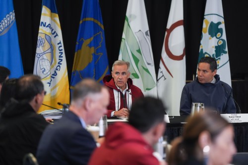 Prime Minister Mark Carney gives opening remarks as Natan Obed, right, President of the Inuit Tapiriit Kanatami, listens during a meeting of the Inuit-Crown Partnership Committee, in Inuvik, N.W.T., on Thursday, July 24, 2025. THE CANADIAN PRESS/Darryl Dyck