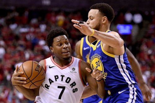 Golden State Warriors guard Stephen Curry (30) fouls Raptors guard Kyle Lowry (7) during Game 2 of the NBA Finals in Toronto on June 2, 2019. THE CANADIAN PRESS/Frank Gunn