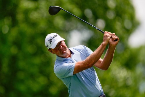 Lucas Glover hits on the 18th tee during first round of the Truist Championship golf tournament at the Quail Hollow Club, Thursday, May 7, 2026, in Charlotte, N.C. (AP Photo/Chris Carlson)
