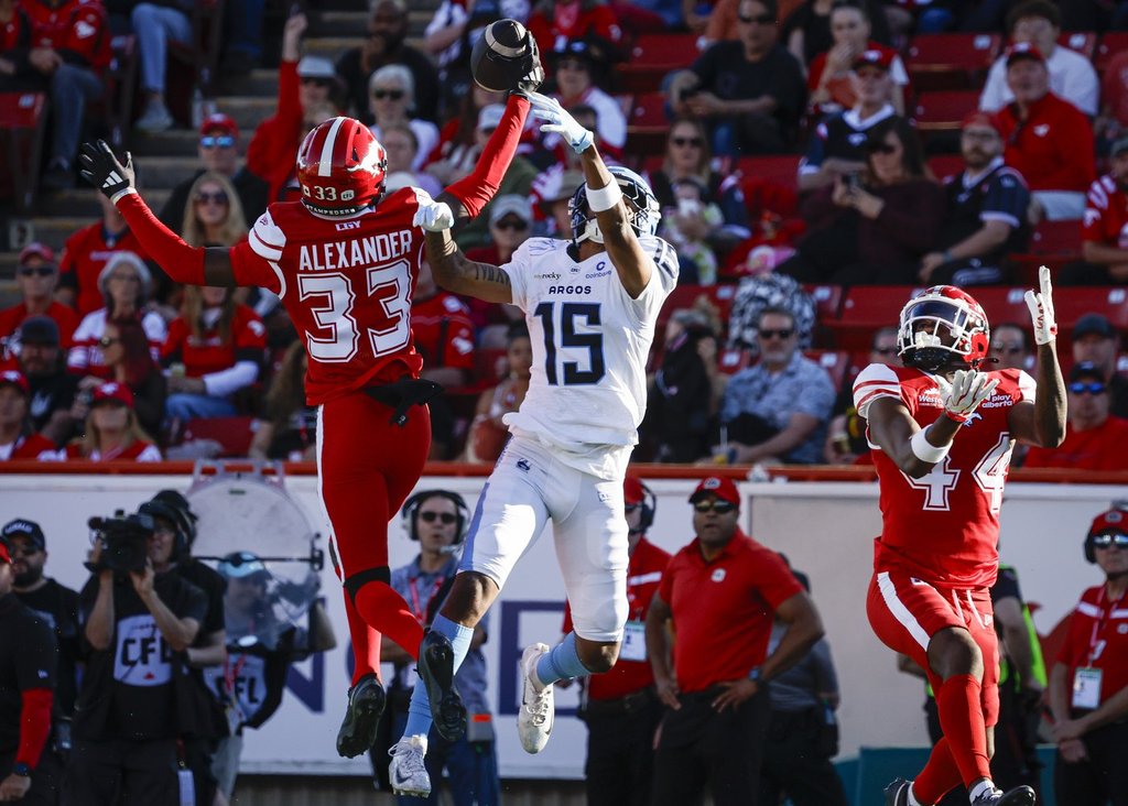 Adams throws six touchdown passes, rushes for one in Stampeders' 58-36 win over Argos