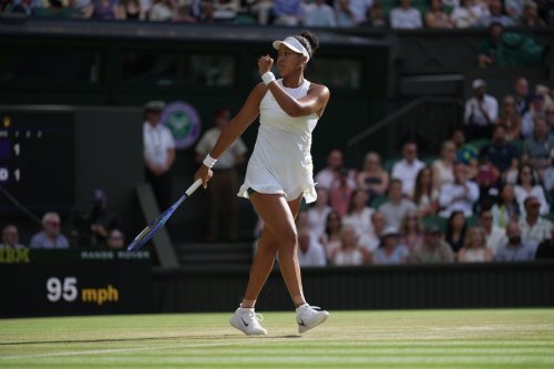 Naomi Osaka of Japan celebrates winning a point against Aryna Sabalenka of Belarus in their fourth round women's singles match at the Wimbledon Tennis Championships in London, Sunday, July 5, 2026. (AP Photo/Brian Inganga)