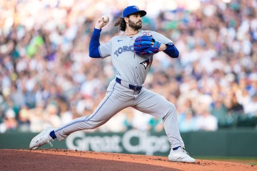 Toronto Blue Jays starting pitcher Dylan Cease throws against the Seattle Mariners during the first inning of a baseball game, Friday, July 3, 2026, in Seattle. (AP Photo/Lindsey Wasson)
