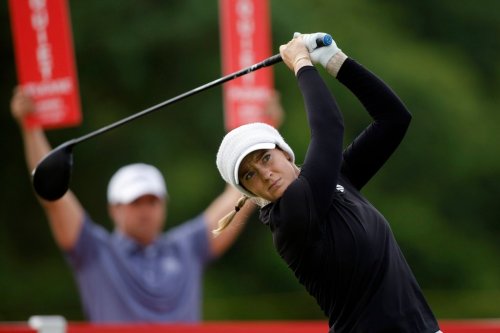 Cassie Porter, of Australia, watches her tee shot on the ninth hole during the first round of the Meijer LPGA Classic golf tournament, Thursday, June 18, 2026, in Belmont, Mich. (AP Photo/Al Goldis)