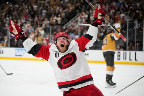 Carolina Hurricanes left wing Nikolaj Ehlers (27) celebrates after scoring an empty-net goal during the third period in Game 6 of the NHL hockey Stanley Cup Final series against the Vegas Golden Knights, Sunday, June 14, 2026, in Las Vegas. (AP Photo/John Locher)