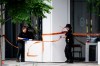 Montreal police work the scene of a shooting the day before, in Montreal on Tuesday, June 23, 2026. THE CANADIAN PRESS/Christopher Katsarov