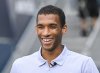 Canada's Felix Auger-Aliassime smiles as he arrives for a media availability ahead of the National Bank Open tennis tournament in Montreal on Thursday, July 30, 2026. THE CANADIAN PRESS/Graham Hughes