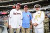 Canada-U.S. Trade Minister Dominic LeBlanc (left), Canadian Ambassador to the United States Mark Wiseman and Rear-Admiral Kristjan Monaghan, Canadian defence attaché (right), pose in this handout photo ahead of an MLB baseball game between the Washington Nationals and the Toronto Blue Jays in Washington on Tuesday, July 28, 2026. THE CANADIAN PRESS/Handout — X, Embassy of Canada in Washington, D.C. (Mandatory Credit)