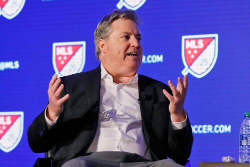 FILE - Los Angeles FC lead owner Larry Berg gestures during an interviewed at the Major League Soccer 25th Season kickoff event in New York, Feb. 26, 2020. (AP Photo/Richard Drew, File)