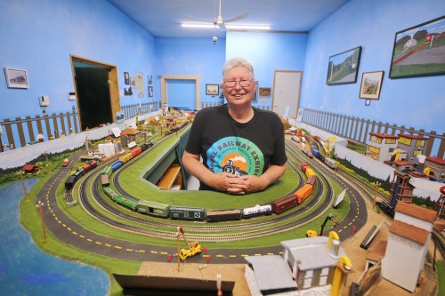 Stan Peck stands in the model railway exhibit at the Irvin Goodon International Wildlife Museum in Boissevain. Peck was named volunteer of the year in the 2026 Tribute to Tourism awards hosted by Tourism Westman in June for his work in the exhibit. Peck has spent years helping to relocate and reassemble a model train track built by the late Earl Patterson, who handcrafted replica landmarks such as the Brandon Generating Station and incorporated them into a diorama with remote trains. (Connor McDowell/The Brandon Sun)