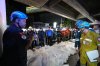 Thailand Prime Minister Anutin Charnvirakul, in blue, inspects the site of a fire as bodies of victims are laid in a row in Bangkok, Thailand, Monday, July 13, 2026. (AP Photo/Sakchai Lalit)