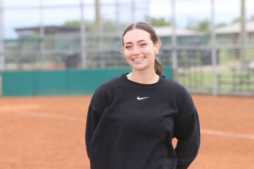 Jessie Henry is shown on a recent afternoon at Ashley Neufeld Softball Complex, where she blossomed into an outstanding player with the Westman Magic and now helps coach the under-15 team. She is entering her third college season this fall when she returns to Minot State. (Perry Bergson/The Brandon Sun) June 27, 2027
