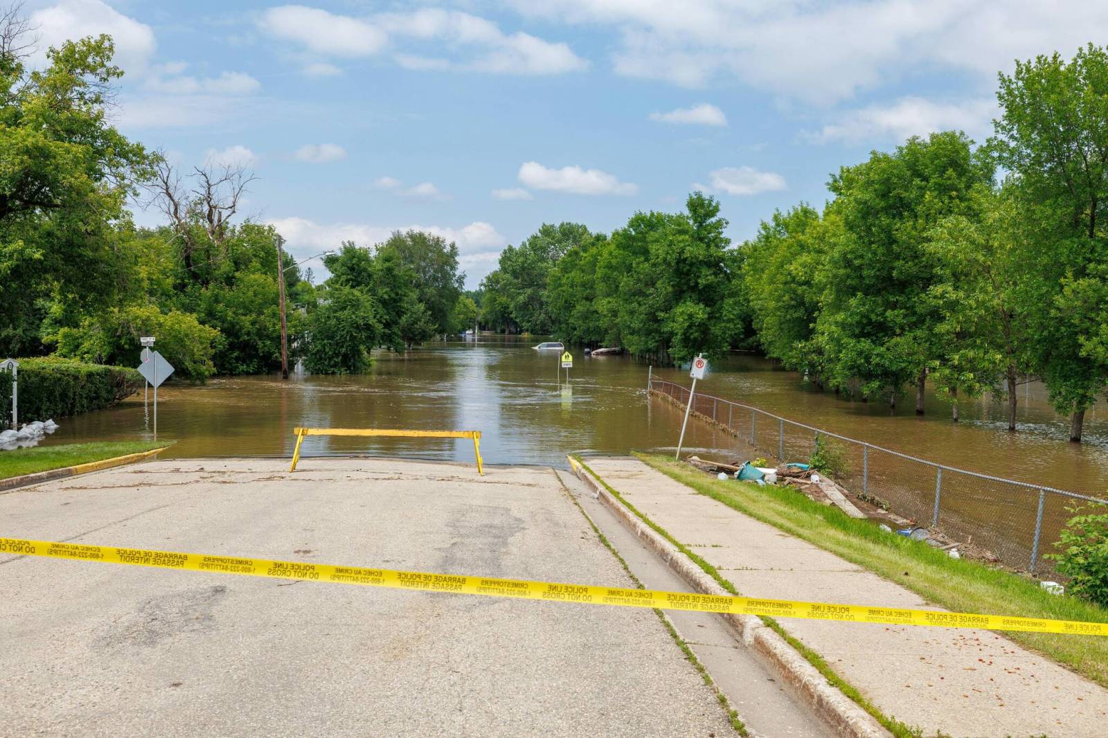 Military, volunteers assess Swan River flooding