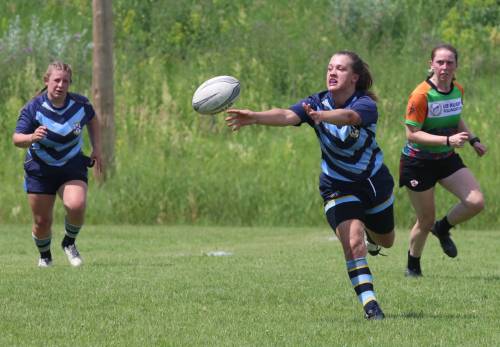 Abby Bakan of the Brandon Barbarians passes the ball to a teammate during a tie game against the Winnipeg Wasps in Rugby Manitoba's senior women's action on Saturday at John Reilly Field. (Perry Bergson/The Brandon Sun)
                                July 11, 2026