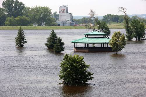 Floodwater continues to inundate Dinsdale Park in Brandon as water levels in the Assiniboine River slowly recede on Thursday despite heavy rainfall overnight and on Wednesday. (Tim Smith/The Brandon Sun)