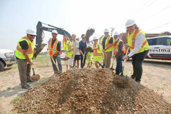 Shovels of dirt fly during a groundbreaking ceremony for the construction of a 72-unit multi-family residential development at 1200 Pacific Ave. on Wednesday. Pictured are Mark Chartrand with Keller Developments (from left), City of Brandon planning director Ryan Nickel, Sneath Group CEO Robyn Sneath, her son Beck Sneath, husband Jason Sneath, daughter Imogen Sneath and son Ellar Sneath, Keller Developments president Evan Keller, Construction Association of Rural Manitoba executive director Shawn Wood and Brandon Mayor Jeff Fawcett. (Matt Goerzen/The Brandon Sun)