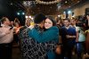 Rep. Haley Stevens, D-Mich., a candidate in the Democratic primary for U.S. Senate in Michigan, right, hugs an attendee during a primary election night event Wednesday, Aug. 5, 2026, in Detroit. (AP Photo/Paul Sancya)