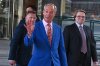 Britain's Reform UK leader Nigel Farage leaves Milbank Tower after he said he'll quit his Parliament seat and seek reelection in London, Tuesday, July 7, 2026.(AP Photo/Thomas Krych)