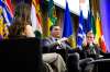 Evan Solomon, Minister of Artificial Intelligence and Digital Innovation and Minister responsible for the Federal Economic Development Agency for Southern Ontario, centre, speaks during a Gen(Z)AI Plenary Convening fireside chat, while Marc Miller, Minister of Canadian Identity and Culture, right, looks on, in Ottawa, on Thursday, April 30, 2026. THE CANADIAN PRESS/Spencer Colby