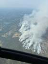 The southeast flank of the Fort Simpson wildfire, designated as FS016 by the government of the Northwest Territories, is seen in a Sunday, June 28, 2026, handout photo published to social media. THE CANADIAN PRESS/Handout - NWT Fire (Mandatory Credit)