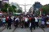 Toronto Police hold back crowds as they respond to an active shooter at the Salsa on St. Clair event in Toronto, on Saturday, July 11, 2026. THE CANADIAN PRESS/Keito Newman
