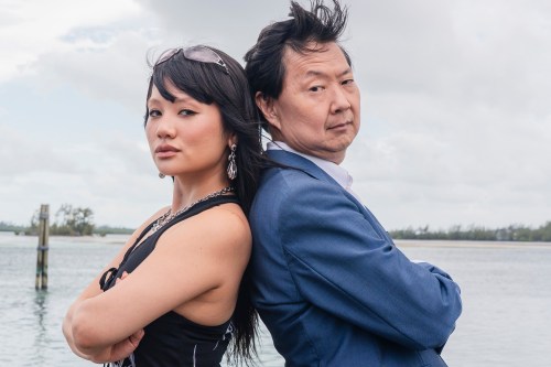 This image released by Discovery Channel shows KPop singer Rei Ami, left, and actor-comedian Ken Jeong who appear in “K-Pop Shark Heroes,