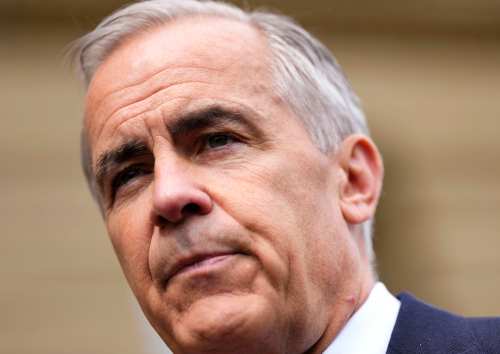 Prime Minister Mark Carney listens to questions from journalists after making a statement outside the Office of the Prime Minister and Privy Council in Ottawa, on Tuesday, July 21, 2026. THE CANADIAN PRESS/Justin Tang