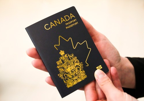 The new Canadian passport is unveiled at an event at the Ottawa International Airport in Ottawa on Wednesday, May 10, 2023. THE CANADIAN PRESS/Sean Kilpatrick