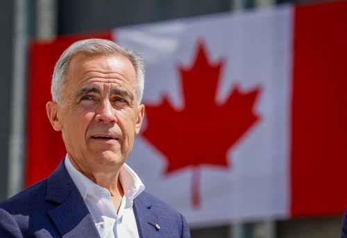 Prime Minister Mark Carney tours a farm near Red Deer, Alta., Wednesday, July 29, 2026. THE CANADIAN PRESS/Jeff McIntosh