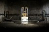FILE - The organ of the John Cage organ project is illuminated prior to a 'sound change' at the Buchardi Church in Halberstadt, Germany, Sept. 5, 2020. (AP Photo/Markus Schreiber, File)