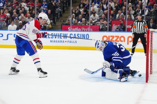 Montréal Canadiens left wing Alexandre Texier (85) scores the game winning goal on Toronto Maple Leafs goaltender Dennis Hildeby (35) during shootout NHL hockey action in Toronto on Saturday, Dec. 6, 2025. THE CANADIAN PRESS/Frank Gunn