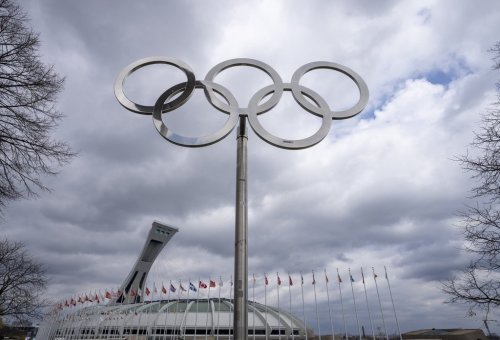 The Olympic rings are displayed outside Olympic Stadium in Montreal on Monday, May 4, 2026. THE CANADIAN PRESS/Christinne Muschi