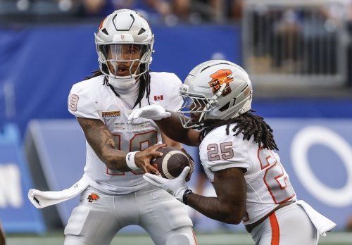 B.C. Lions quarterback Kaidon Salter (19) hands off to Emani Bailey (25) during first half CFL football action against the Winnipeg Blue Bombers in Winnipeg on Thursday, July 30, 2026. THE CANADIAN PRESS/John Woods