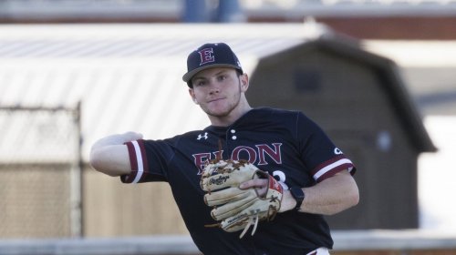 Elon's Ryan Sprock (13) makes a throw during an NCAA baseball game on Tuesday, Feb. 25, 2025, in Winston-Salem, N.C. (AP Photo/Ben McKeown)
