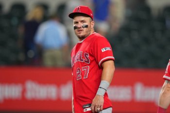 Los Angeles Angels designated hitter Mike Trout looks on following a baseball game against the Texas Rangers, Wednesday, July 8, 2026, in Arlington, Texas. (AP Photo/Julio Cortez)