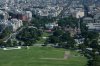 Construction continues on the helipad, center, and ballroom, right at White House, Friday, Aug. 7, 2026, in Washington. (AP Photo/Allison Robbert)