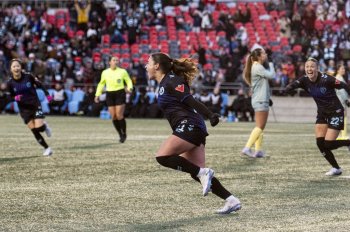 Ottawa Rapid's Melanie Forbes (21) celebrates her goal against the Vancouver Rise during second half Northern Super League semifinal soccer action in Ottawa, on Saturday, Nov. 8, 2025. THE CANADIAN PRESS/Spencer Colby