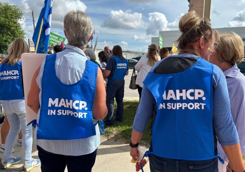 Manitoba Association of Health Care Professional supporters and workers rally in Winnipeg on Wednesday Sept. 2, 2026. A scheduled strike of 350 laboratory workers in the province is set to take place on Tuesday Sept. 8, 2026. THE CANADIAN PRESS/Brittany Hobson