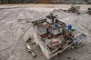 A drone view shows a damaged residential building along the swollen Trishuli River in the aftermath of flash floods in Nepal's Nuwakot district, Thursday, Sept. 3, 2026. (AP Photo/Rajesh Kumar Singh)