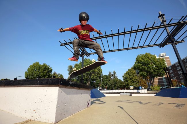 19082026
Eleven-year-old Zurin Turner kickflips off a ledge at the Kristopher Campbell Memorial Skate Plaza in Brandon on a sunny Wednesday. afternoon. Turner has been skateboarding for three years. 
(Tim Smith/The Brandon Sun)