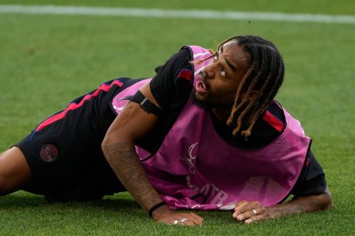 PSG's Bradley Barcola eyes the ball during a training session ahead of the UEFA Super Cup soccer match against Aston Villa in Salzburg, Austria, Tuesday, Aug. 11, 2026. (AP Photo/Darko Bandic)