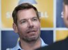 FYI - Rep. Eric Swalwell, D-Calif., talks with reporters after holding a town hall meeting in Sacramento, Calif., April 7, 2026. (AP Photo/Rich Pedroncelli, File)